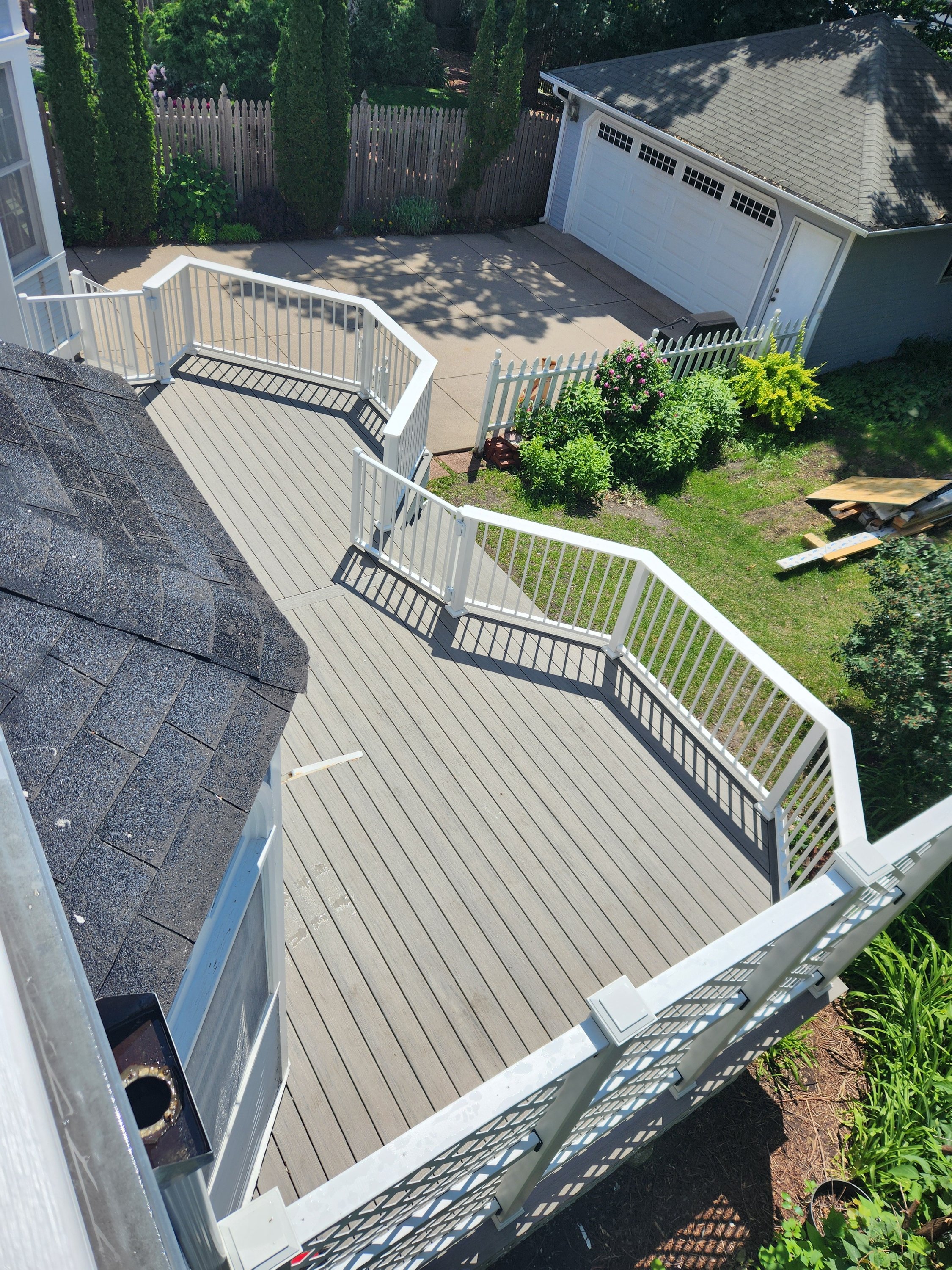 Weather-resistant composite deck in Minnesota backyard.