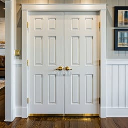 interior doors of a small modern contemporary midwestern home with gold or brass hinges and handles-4