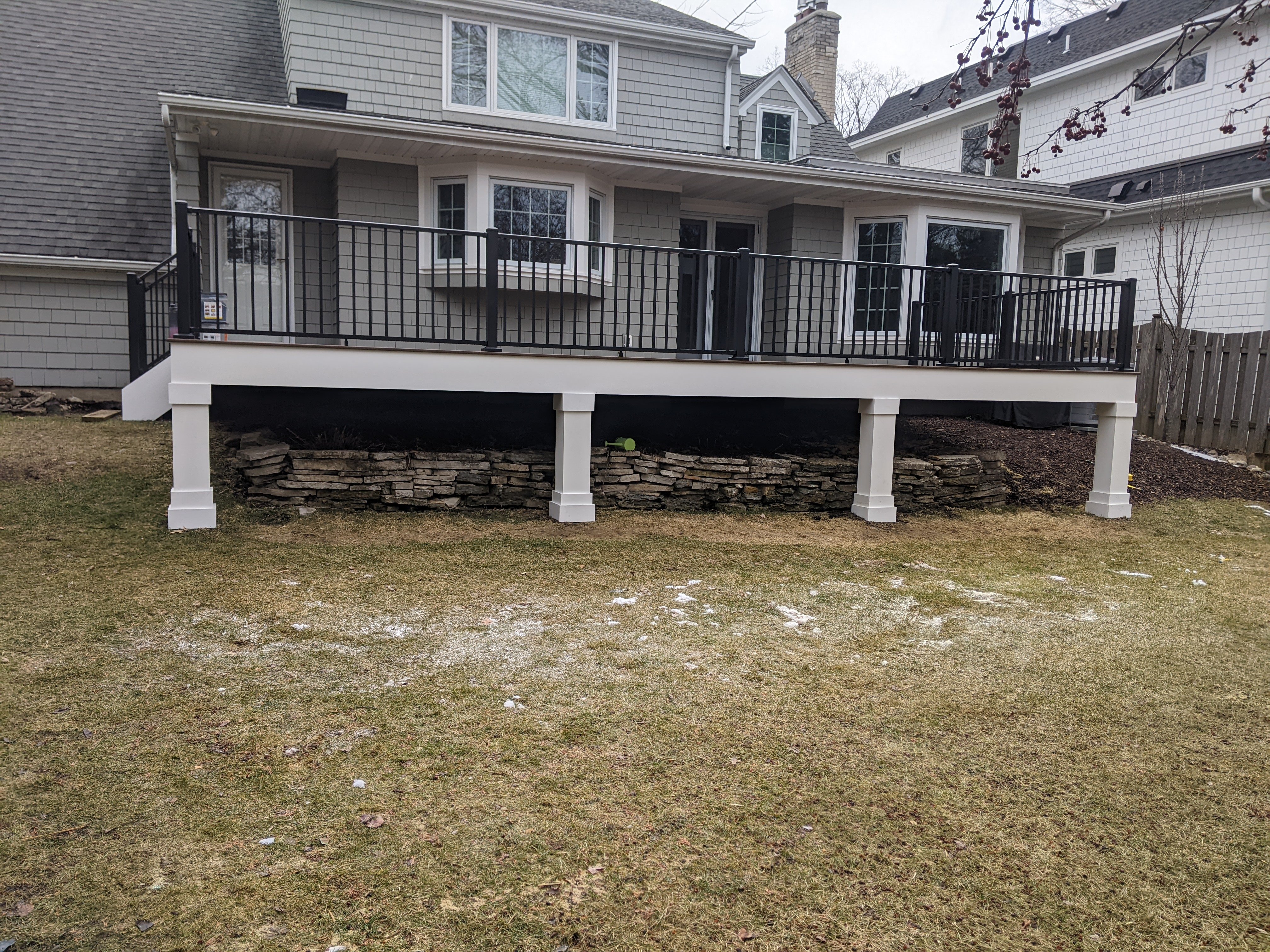 Custom outdoor deck constructed by local Minnesota contractors