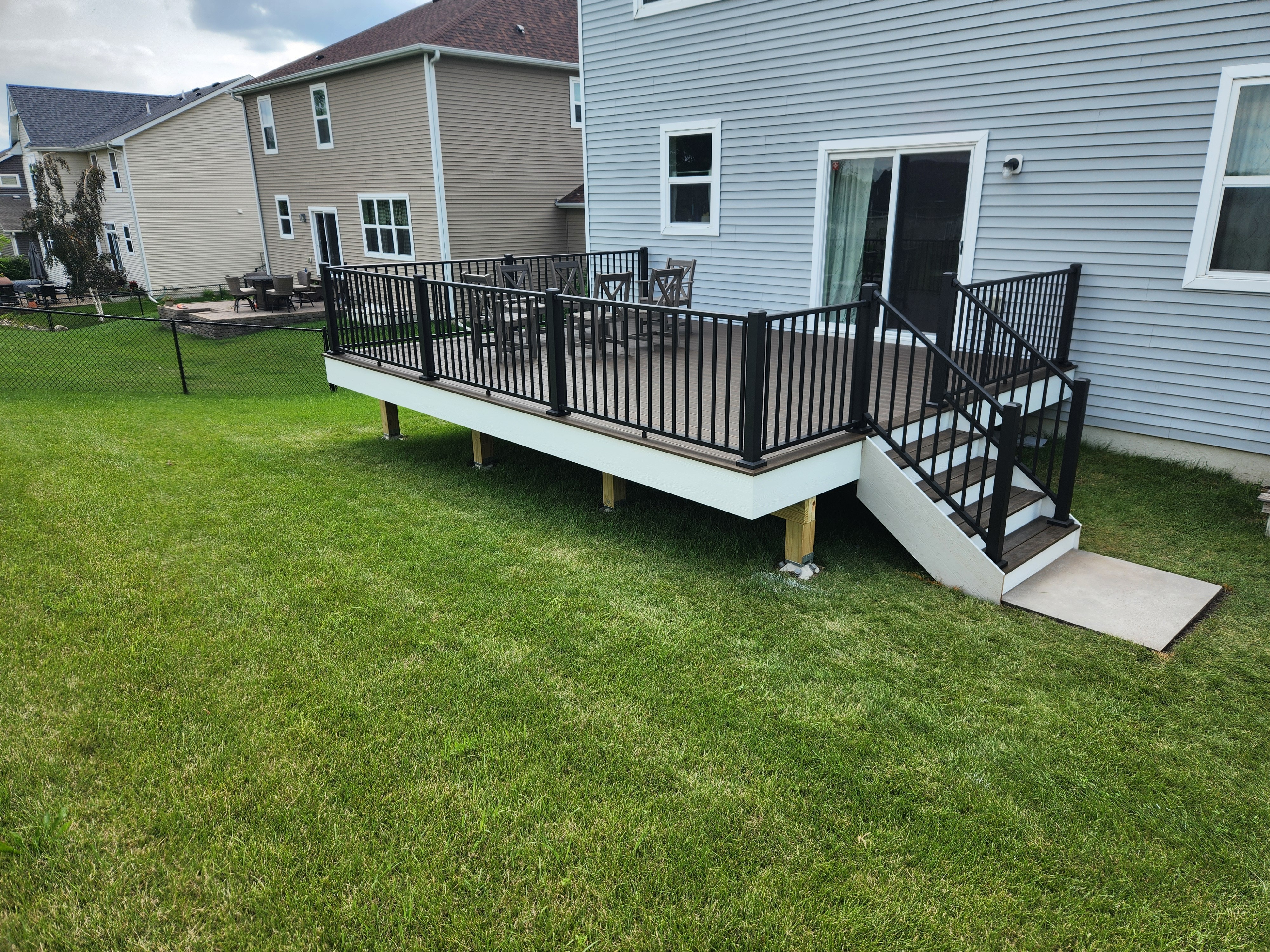 beautiful, custom designed deck with composite decking built by Home Visions Carpentry
