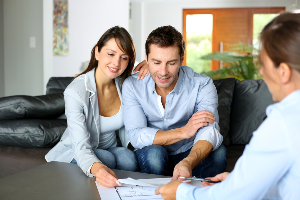 Couple discussing creative ideas for a finished basement | Home Visions Carpentry